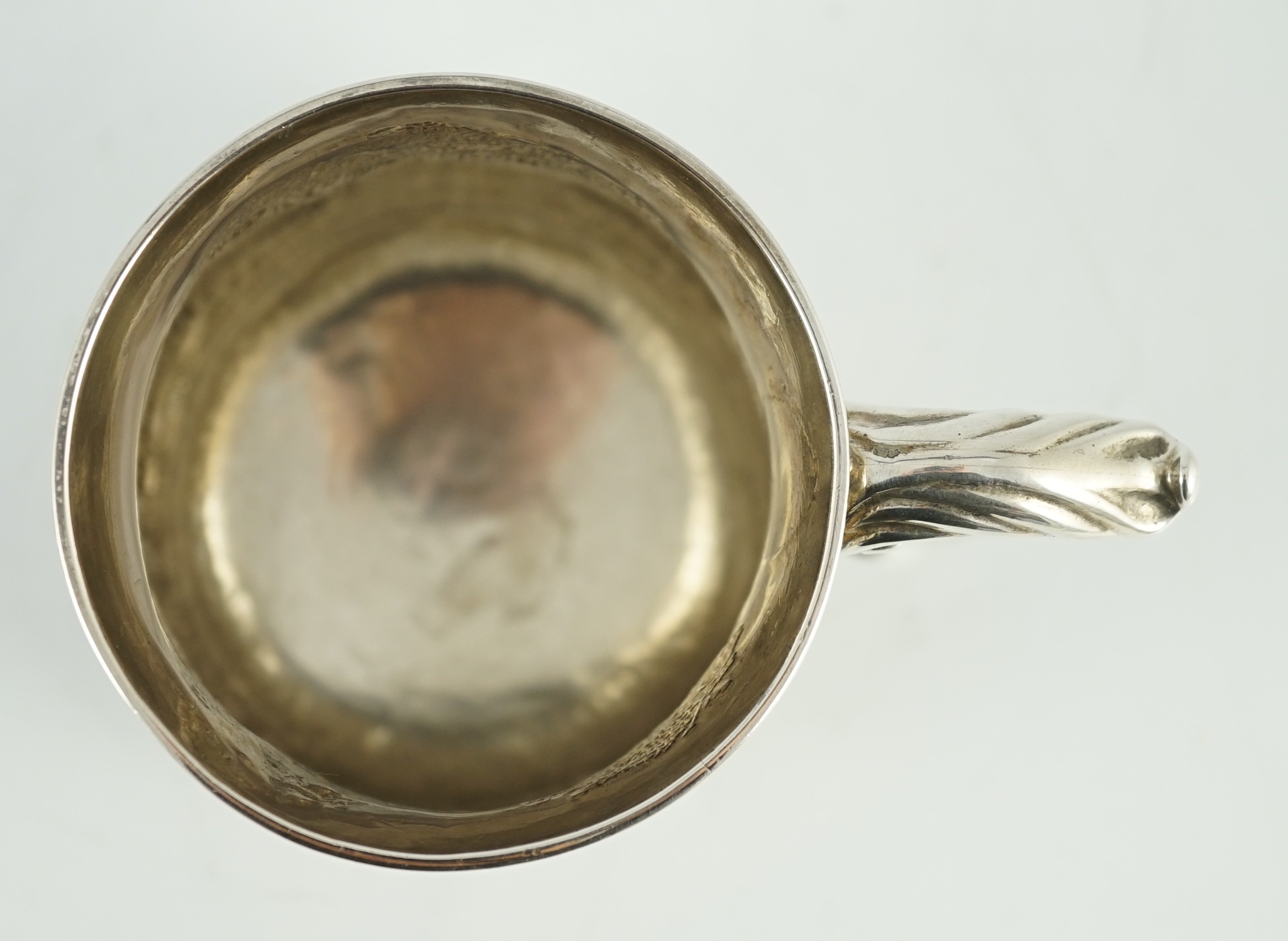 A George II silver baluster mug, later embossed with continuous hunting scene, Richard Gosling